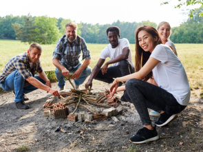 group of people collects firewood