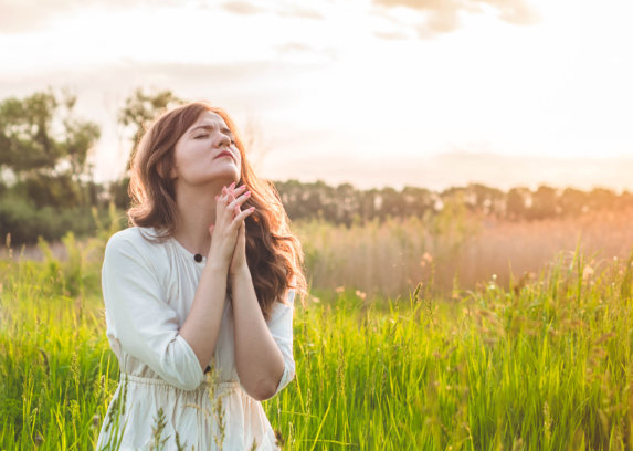 young woman praying