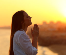 young woman praying