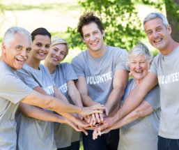 group of volunteer smiling together