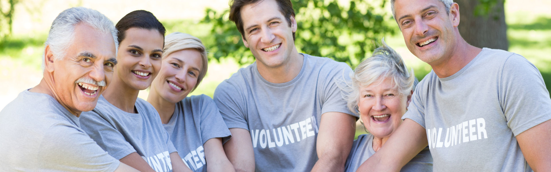 group of volunteer smiling together