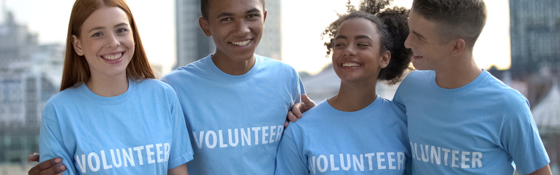 group of young volunteer smiling