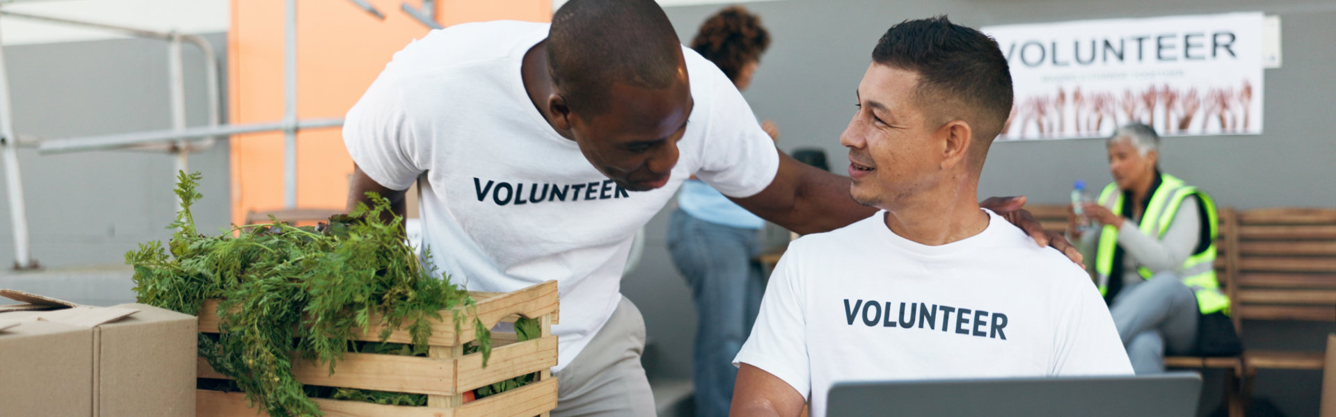 two volunteer talking